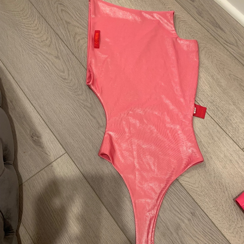 A BODY SUIT & SKIRT